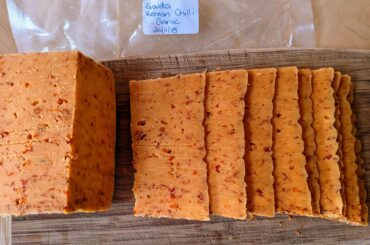 Home made Gouda cheese with Korean Chilli and garlic. Vintage 2018. I used a commercial dried chilli rather than my own, and it was milder than anticipated.