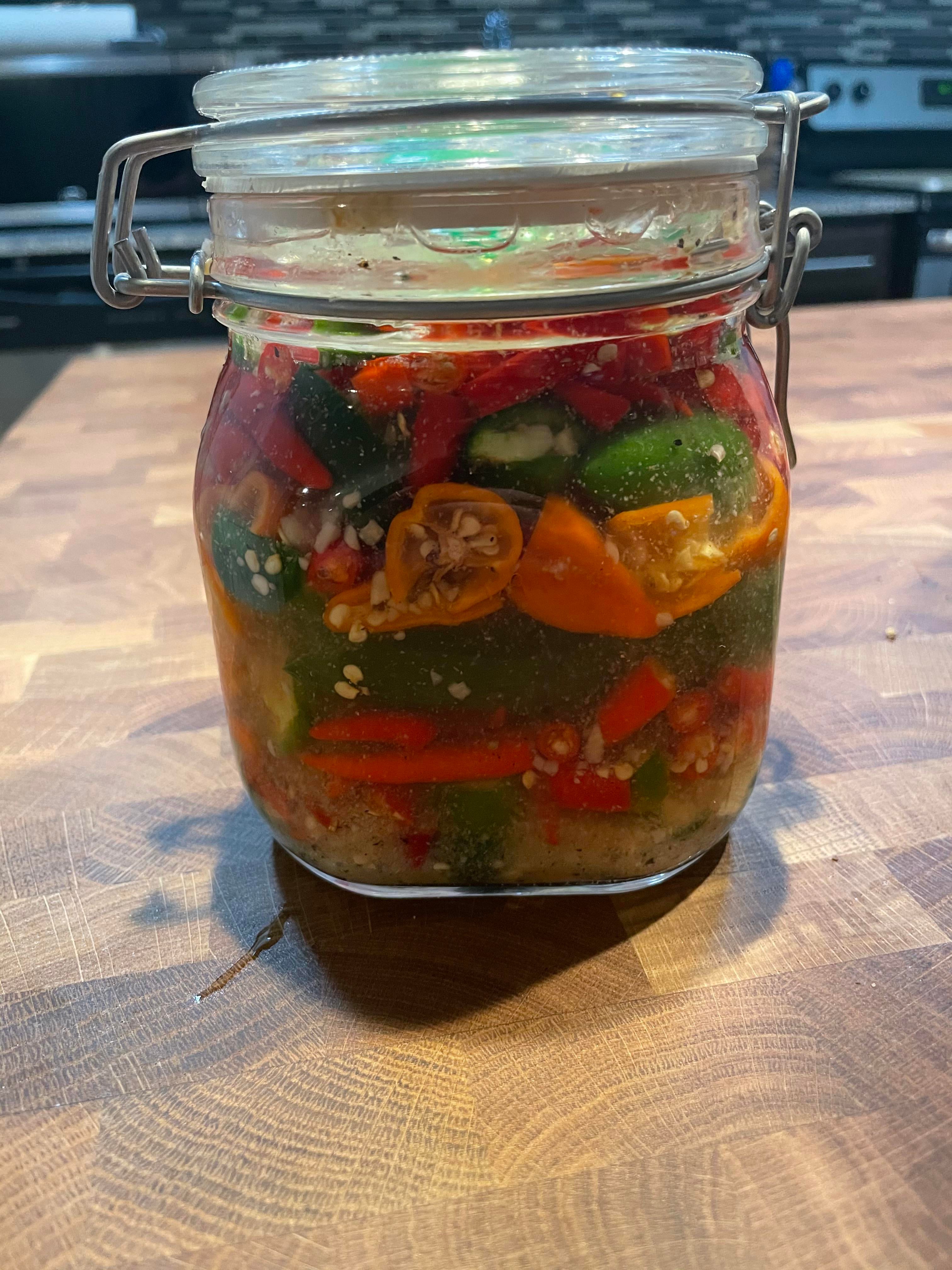 My first attempt at fermented hot sauce. Thai chili’s, Serrano peppers