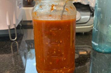 Hot sauce I made!! Using garlic, vinegar, 10 green and red chilis and 4 dried and 5 normal habaneros, also used some other obscure long red pepper that was really expensive.