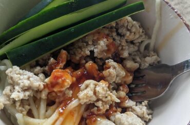 Lomein noodles, ground chicken with Kung Pao/ Asian Zing sauce and cucumbers. Quick Easy & Delicious
