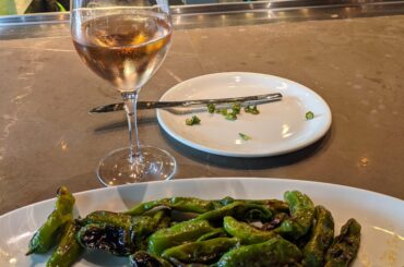 Small plate shishito peppers at wine bar in Disney Springs.