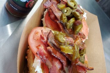 Bagel with cream cheese, peppers, bacon, tomato and hotsauce