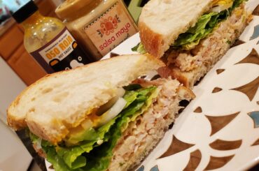 Homemade chicken salad sandwich with habanero aioli and mustard