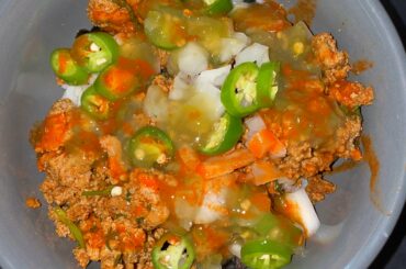 Topped my bowl with serranos, Mrs. Renfro’s green salsa, and Tapatio. So good!