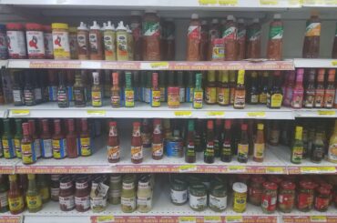 I went to the International Market today, the "Mexico" section had a serious variety of hot sauces. You should be able to expand this photo to see the names.