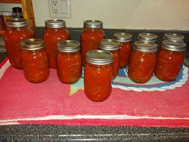 Homemade salsa with jalapenos and scotch bonnets