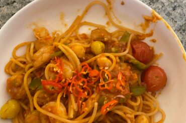 Seafood pasta with homegrown raw red savina habanero, tomato, garlic, and bell pepper. (poor lighting)