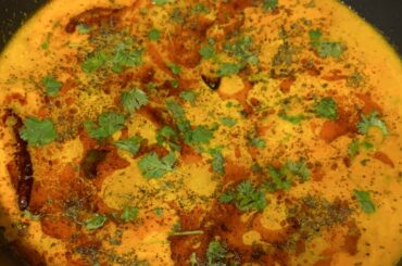 Dum Aloo with extra ghee tadka - baby potatoes in onion-tomato-yogurt-cream based gravy with a second ghee and dried red chillies based tempering - very happy with how this came out!