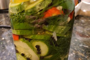 Carolina Reaper pickles using cucumbers, peppers, and dill from my garden.