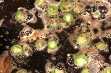 Thin sliced jalepenos cross pollinated with reaper pan fried in butter and steak fat.