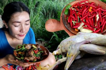 Yummy Cooking duck spicy chili delicious food in jungle - Survival skills