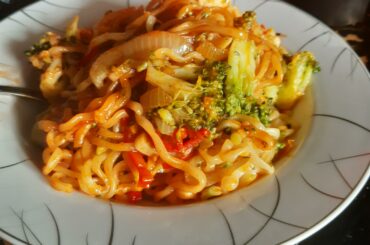 Samyang buldak with brocoli chicken garlic peppers and hella onion.