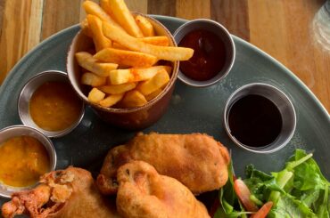 Mango Hot Sauce with Fish and Chips from a restaurant in Saint Lucia.