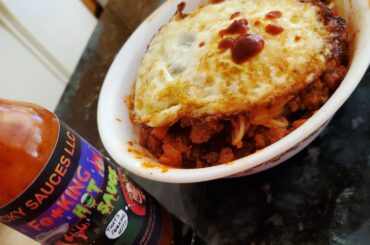 Make leftovers great again. Leftover spaghetti with a fried egg on top and hotsauce