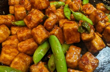Crispy ghost pepper tofu with basil and snap peas