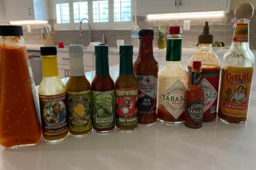 Our collection grows! (Homemade cayenne and jalapeno sauce on the left!)