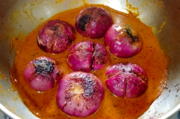 Spicy Stuffed Onion Curry Recipe - Recipe in comment