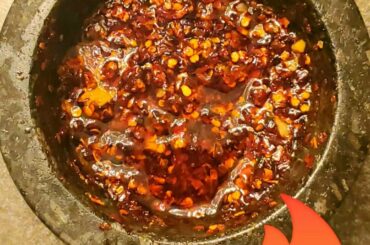 Just came across this subreddit and thought I'd share my homemade chili garlic oil. I use both red pepper flakes and fresh hawaiian chili peppers to get the right amount of spice. This stuff goes on everything.