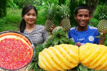 Wow Mouth Watering With Eating pineapple And Salt Chili In The Countryside.