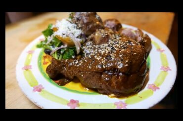 Fried duck with chocolate chili sauce Spice for life