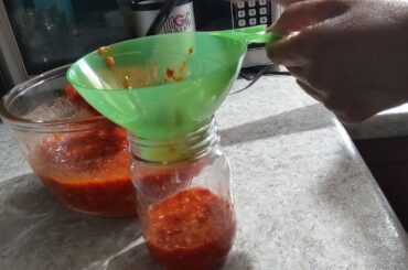 Making chili pepper sauce.