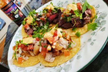 Homemade spicy steak and baked fish tacos