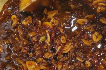 Chili crisp. I used Serious Eats' recipe, but added a Carolina Reaper to amp up the heat.