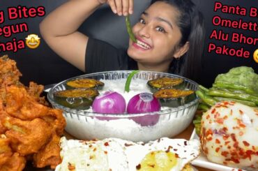 PANTA BHAT/POKHAL BHAAT, SUNNY SIDE UP EGGS, GOBI PAKODA, ONION PAKODA,ALU BHORTA,BEGUN BHAJA,CHILLI