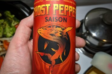 Ghost pepper saison beer, light and crisp with a spicy bite that doesn't linger. Gluten-free too. (Curry cooking in the background)