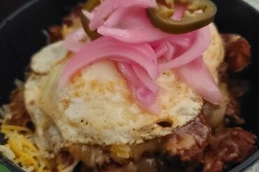 [Homemade] hot hatch red chile huevos ranchers w/ spicy pickled red onion