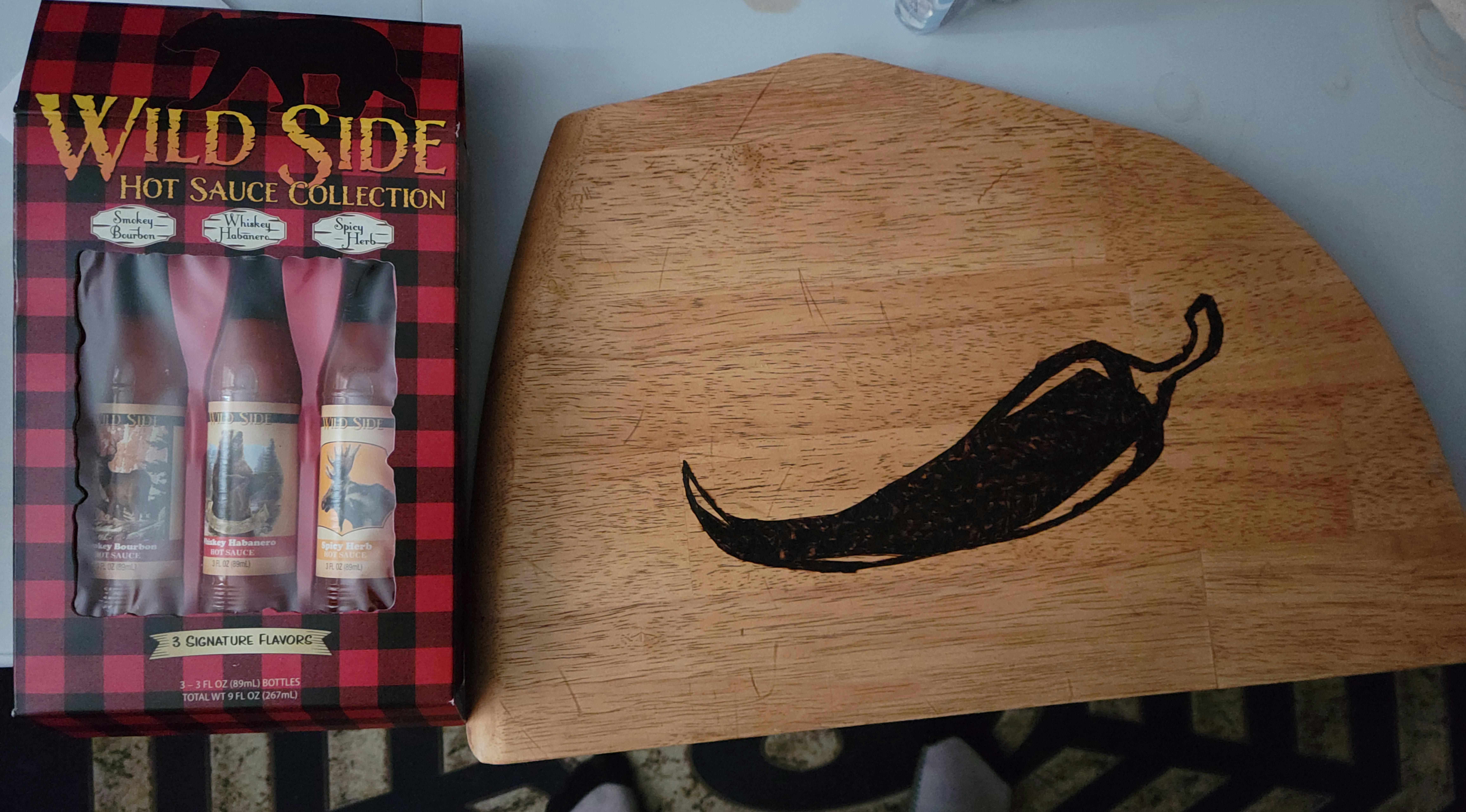Amazing gift from one of my employees. She made and burned the cutting board herself.
