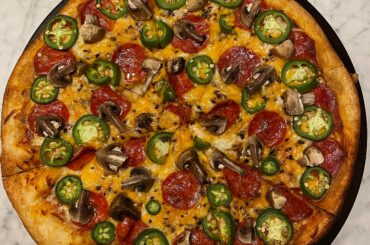 Homemade pizza - superb vessel for Can’t Feel My Face flakes from Flatiron!