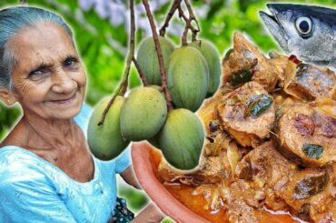 Creamy and delicious fish curry with mangoes cooked in a coconut milk based gravy | Grandma Menu