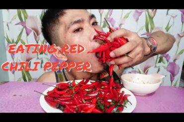 EATING RED HOT CHILI PEPPER..(SPICY FOOD)