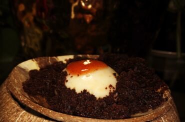 Burrowed scorpion panna cotta: brownie crumbs, peanut panna cotta, strawberry Fireball sauce with scorpion chili powder