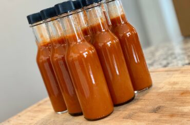 Homemade hot sauce, 60 day fermented Chocolate Bhutlah, ginger, garlic and onion- it's hot!