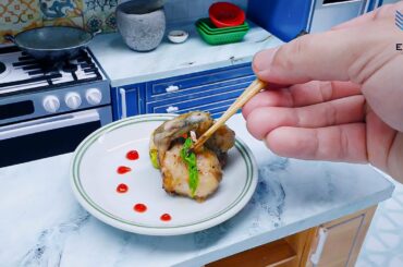 Homemade Miniature Pan Fried Frog Thighs Served with Butter Fried Vegetables Recipe / Food Cooking