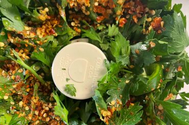 Blending up some fresh chimichurri with peri peri flakes