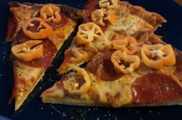 Just trying to make this frozen pizza a bit better.