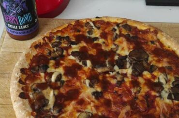 What's for lunch today, r/spicy? Homemade three cheese and mushroom pizza with the Berry Bomb for me