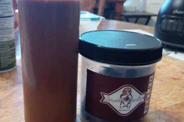 (homemade) black garlic habanero hot sauce.