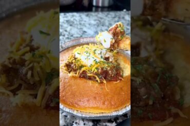 SPICY CHILI SERVED IN A CORNBREAD BOWL
