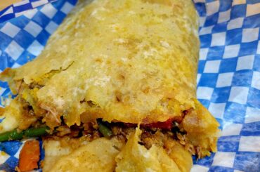 Continuing my vacation trend: Jerk Chicken and Vegetables Roti.