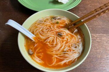 Noodles, shiitakes, green onion, chicken bouillon, and a heap of Szechuan pepper powder
