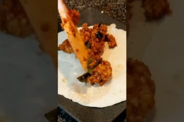 spicy pork carnitas tacos with pickled onions and chili lime crema