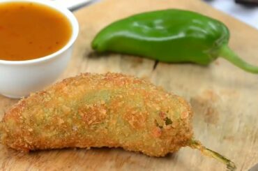 Chicken Chili Cheese recipe. cheese and chicken Filling in chillies. chicken chili pakoda recipe.
