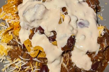 Ghost pepper chips topped with queso and slow cooked beef and chorizo chili