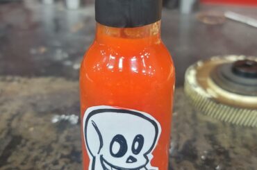 Some amazing hot sauce my buddy made. 40 death spiral peppers per 16oz in this batch. Delicious.