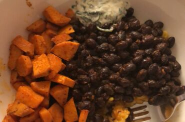 Cuban Chili ghost pepper black beans on curry rice, sour cream cilantro sauce, baked yam slices, and topped off with loads of Melinda’s ghost pepper hot sauce!
