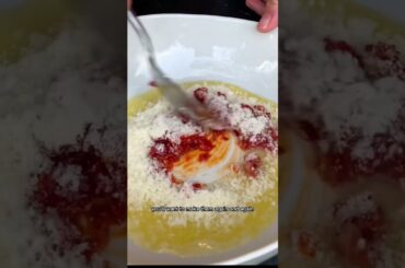 CRISPY PARMESAN AND CALABRIAN CHILE SMASHED POTATOES